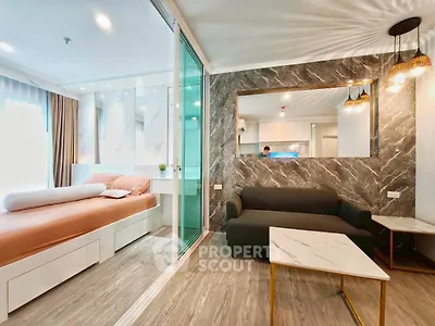 Modern studio apartment with stylish decor and open layout in prime location.