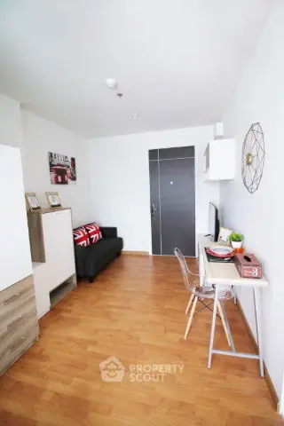 Modern studio apartment with stylish decor and wooden flooring