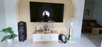 Modern living room with sleek TV setup and stylish decor