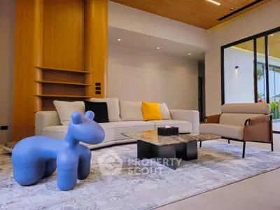 Modern living room with stylish furniture and unique decor in a contemporary home.