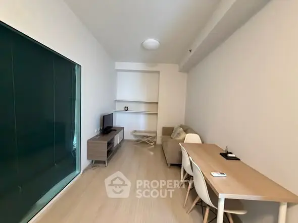 Modern living room with sleek furniture and minimalist design, perfect for urban living.