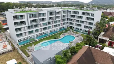 Modern apartment complex with pool and rooftop garden in scenic location