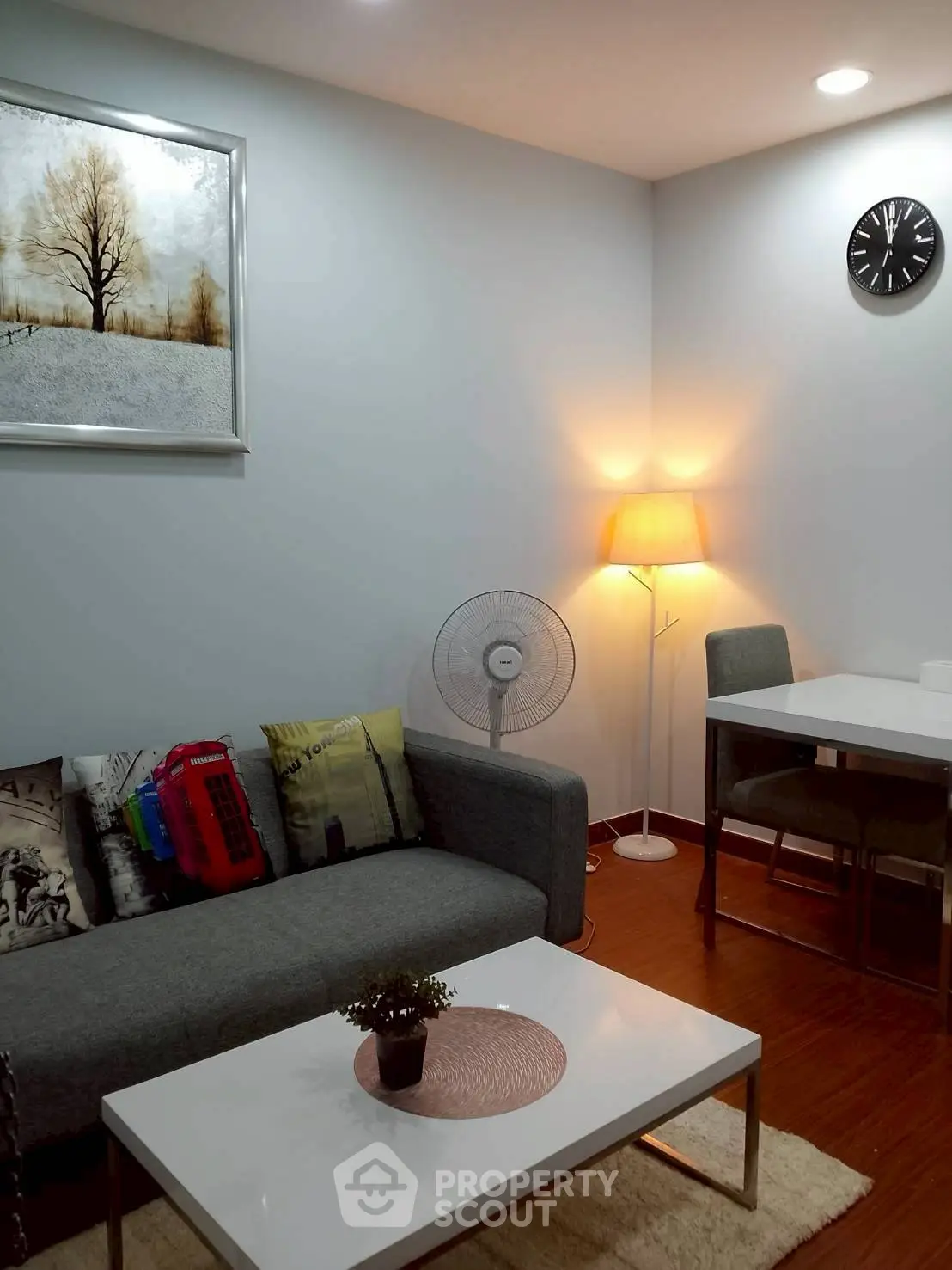 Cozy living room with modern decor and warm lighting