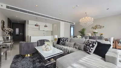 Luxurious modern living room with elegant decor and open kitchen layout