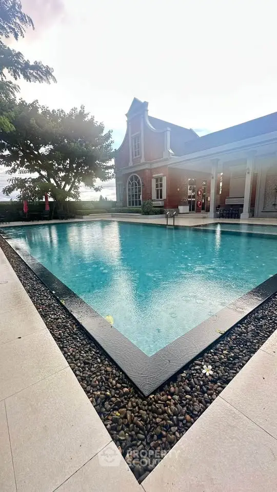 Luxurious estate with elegant pool and classic architecture, perfect for upscale living.