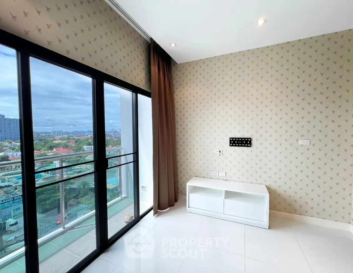 Modern high-rise apartment with stunning city view and elegant interior design.