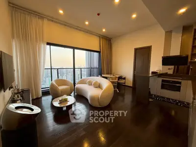 Luxurious high-rise living room with stunning city view and modern furnishings.