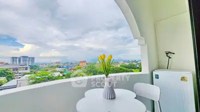 Charming balcony with stunning city view, perfect for relaxation and enjoying the skyline.