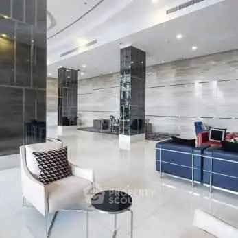 Luxurious modern lobby with sleek design and elegant seating area