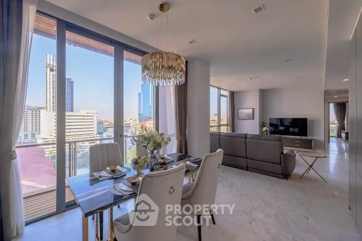 Luxurious open-plan living room with stunning city views and elegant dining area.