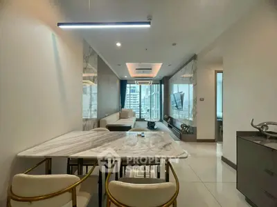 Luxurious modern living room with marble accents and city view