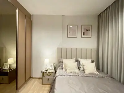 Elegant bedroom with modern decor and cozy ambiance