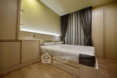 Modern bedroom with sleek wooden furniture and ambient lighting