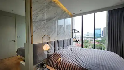 Luxurious bedroom with stunning city view and modern design