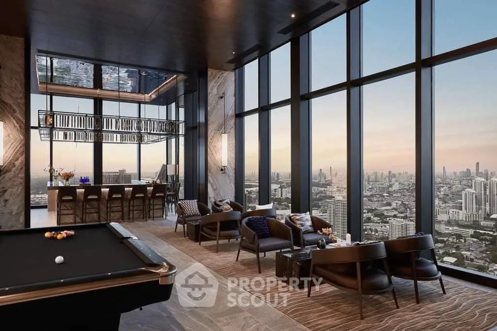 Luxurious high-rise living room with panoramic city views and elegant decor.