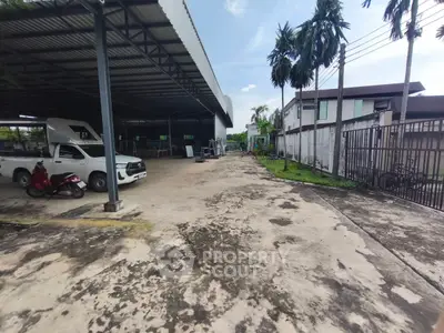 Spacious industrial property with large covered area and ample parking space