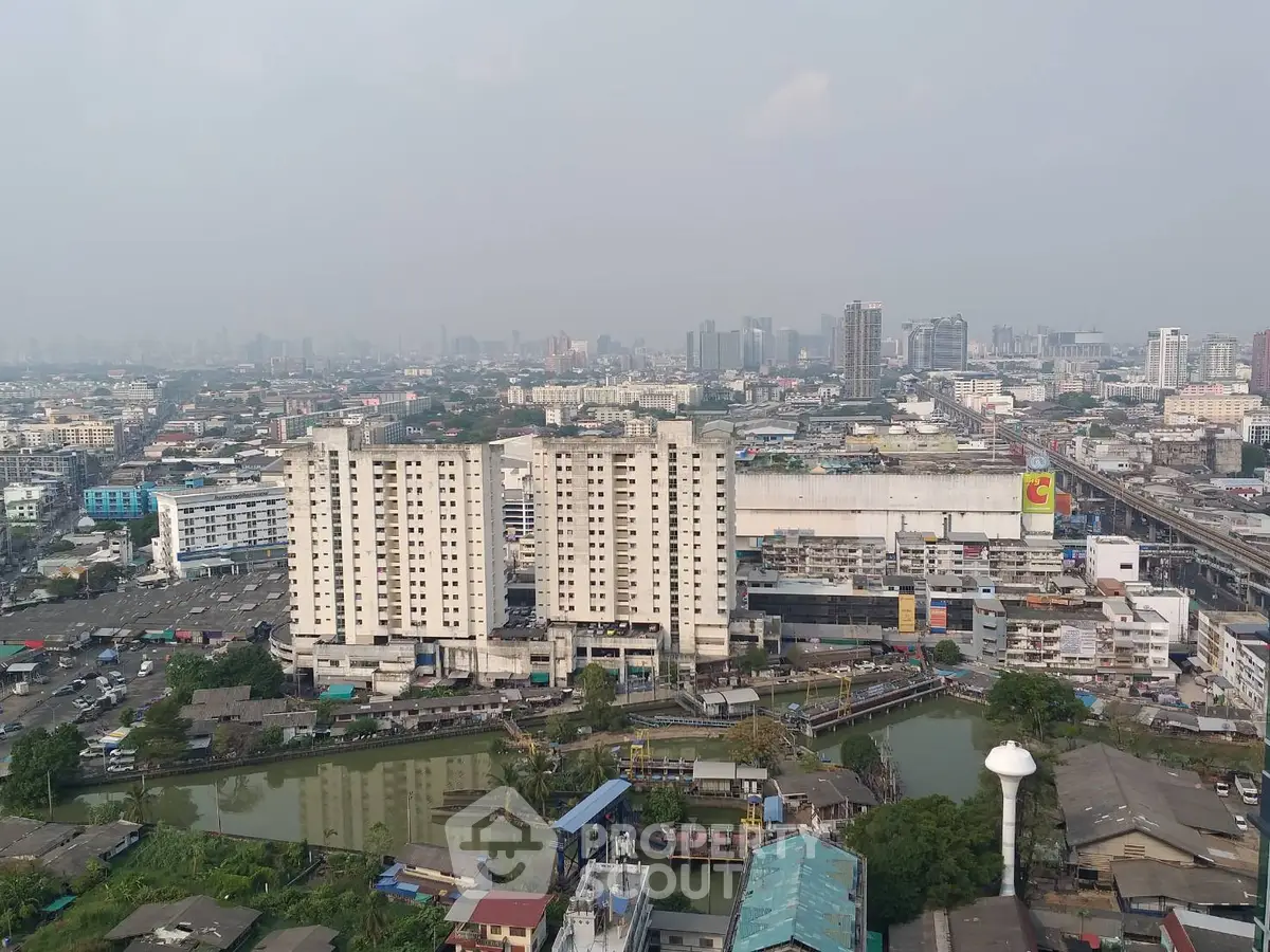 Stunning aerial view of urban skyline with high-rise buildings and bustling cityscape.