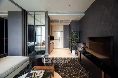 Modern living room with sleek design and open kitchen layout