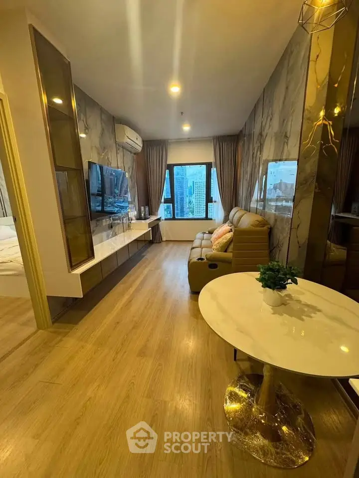 Luxurious living room with modern decor and city view, featuring elegant furniture and stylish lighting.