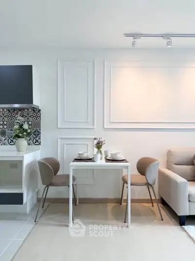 Modern living room with elegant dining area and stylish decor