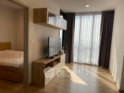 Modern apartment interior with natural light and stylish furnishings