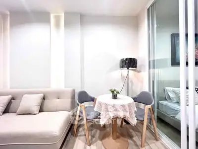 Modern living room with cozy seating and stylish decor