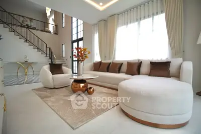 Luxurious modern living room with elegant furniture and natural light