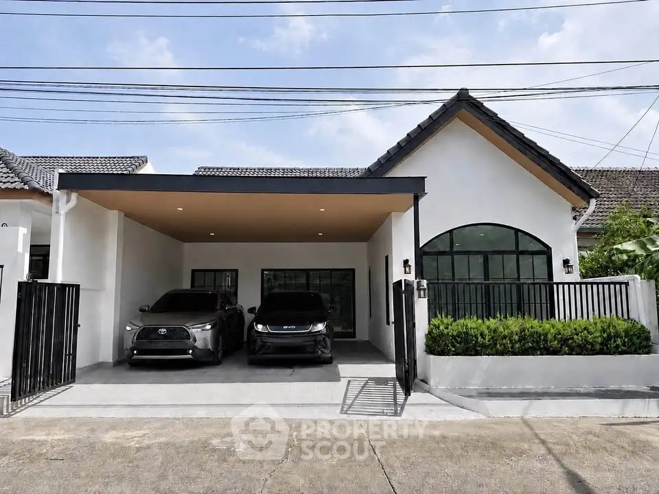 Charming modern house with spacious carport and sleek design in a serene neighborhood.