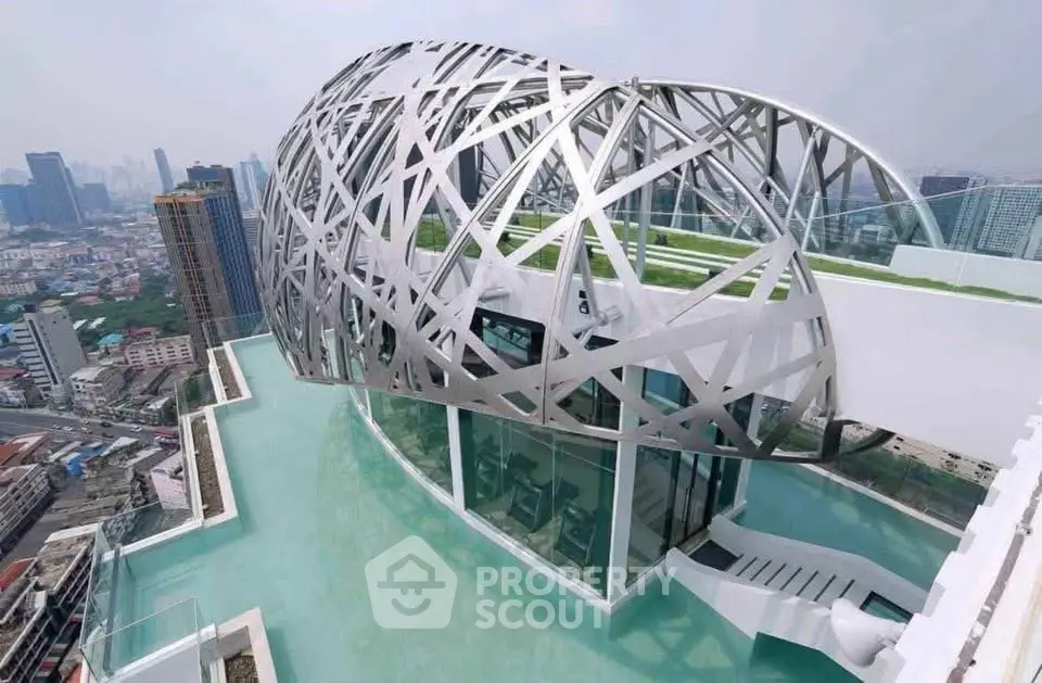 Stunning rooftop architectural marvel with panoramic city views and unique design.