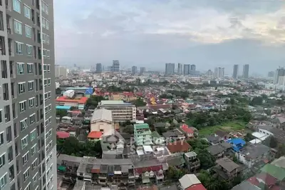 Stunning cityscape view from high-rise building showcasing urban landscape and skyline.