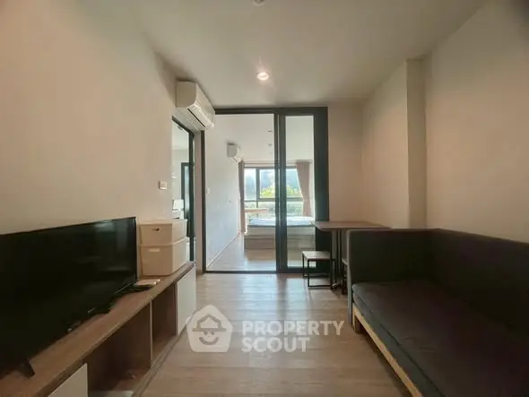 Modern living room with sleek furniture and natural light