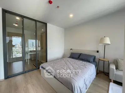 Modern bedroom with city view and stylish decor