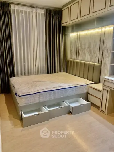 Luxurious bedroom with elegant bed and ample storage in modern apartment