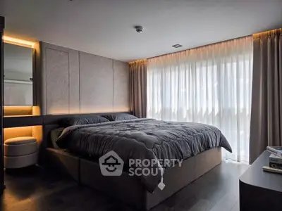 Luxurious modern bedroom with elegant lighting and plush bedding