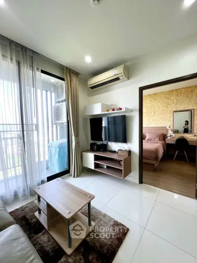 Modern living room with balcony access and stylish decor