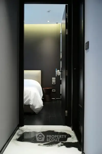 Luxurious modern bedroom entrance with sleek design and ambient lighting