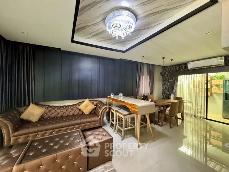 Luxurious living room with elegant decor and modern lighting