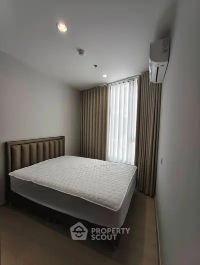 Modern bedroom with minimalist design and natural light