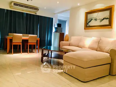 Spacious living room with elegant furniture and modern decor