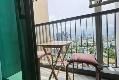 Charming balcony with city view, perfect for relaxing and enjoying the skyline.