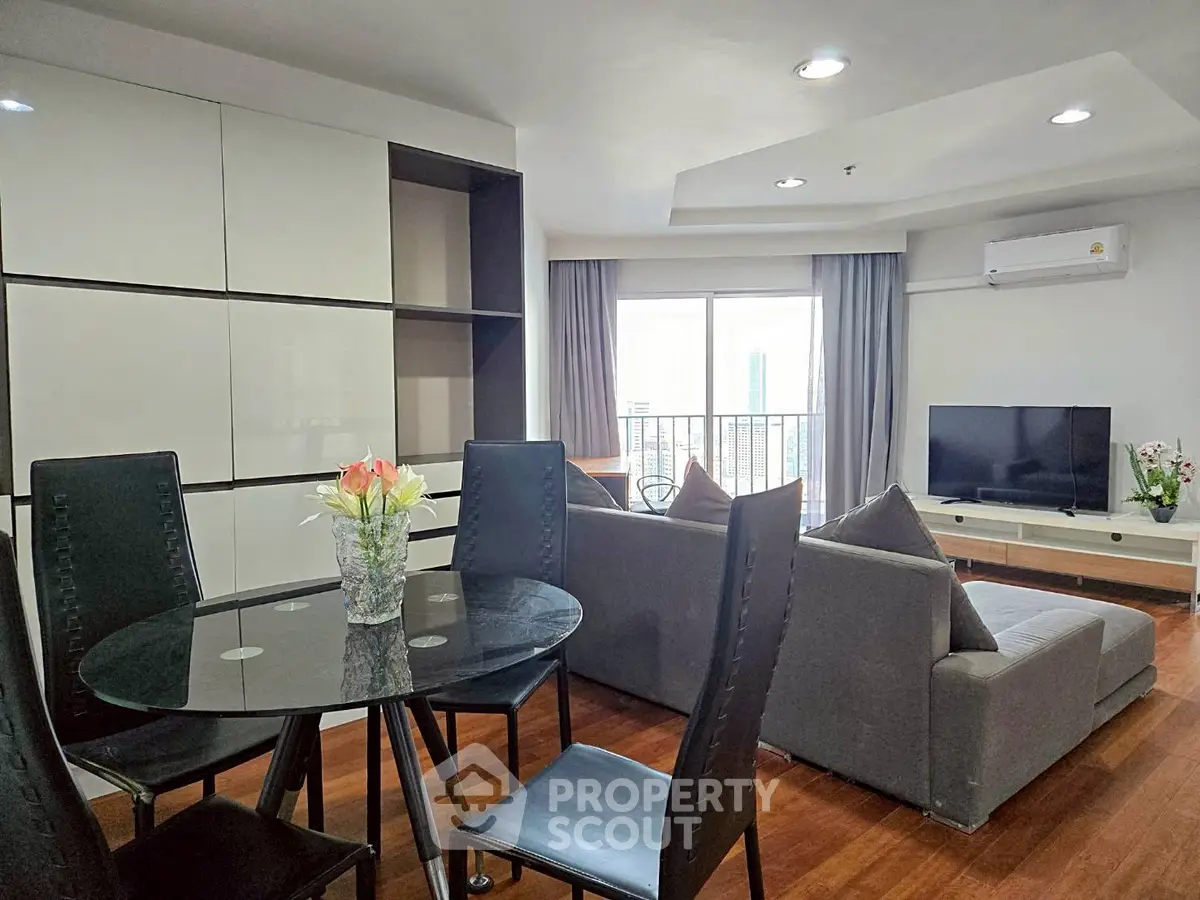 Spacious modern living room with sleek furniture and natural light