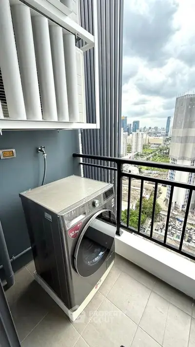 Modern balcony with washing machine and city view, perfect for urban living convenience.