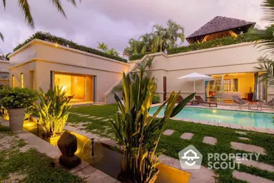 Luxurious villa with private pool and lush garden, perfect for serene living.