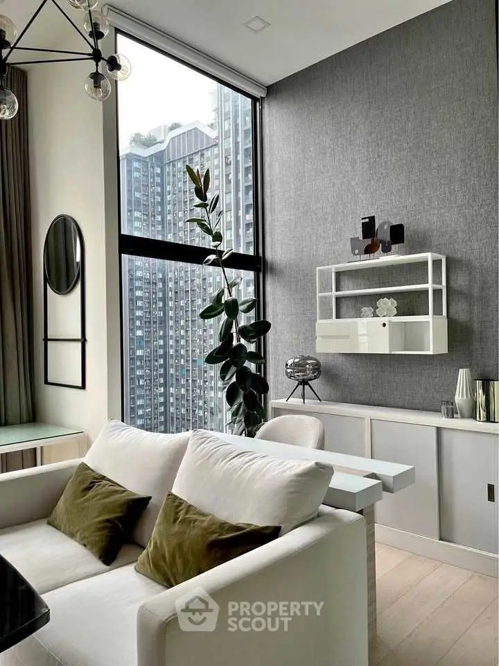 Modern living room with high ceiling and large window offering city view