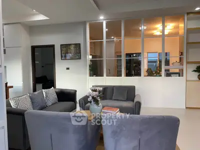 Stylish living room with modern furniture and open layout, perfect for relaxation and entertaining.