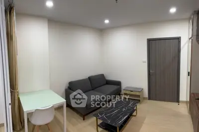 Modern living room with sleek furniture and stylish decor