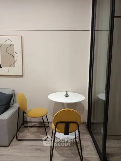 Modern interior with stylish yellow chairs and minimalist decor