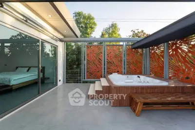 Luxurious modern terrace with jacuzzi and stylish decor, perfect for relaxation and entertainment.