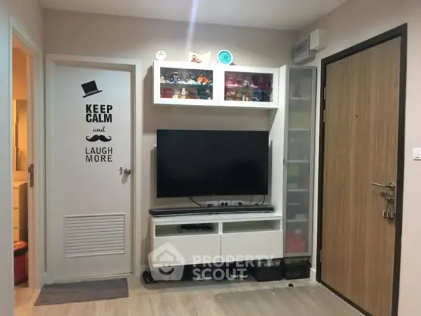 Modern living room with wall-mounted TV and stylish decor