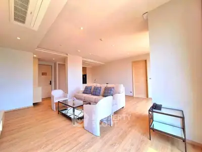 Spacious modern living room with elegant furniture and natural light